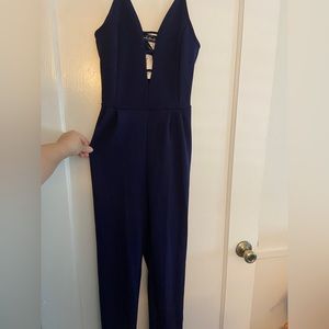 SOLD! New with tags. Navy blue jumpsuit.